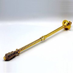 Deacon's hand-held brass candlestick in gilt with inlays