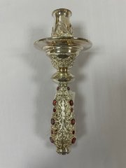 Hand-held brass candlestick with inserts