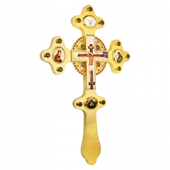 Gilded brass cross on the altar