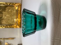 A glass under the lamp (green)