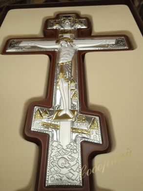 Silver cross in the hand
