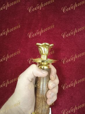 Candlestick in hand
