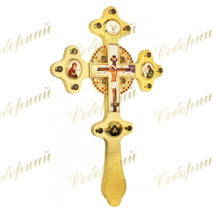 Gilded brass cross on the altar