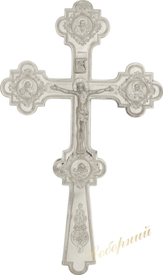 Silvered cross on the altar.