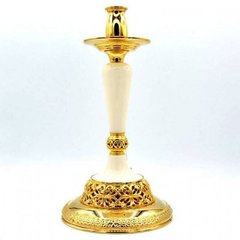 Gilded brass candlestick with acrylic feet