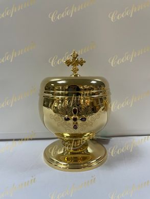 A chalice for the storage of the prosphoras, gilded brass with inlays.