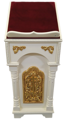 Single wooden lectern with gilded elements.