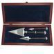 A set of pens in a wooden case
